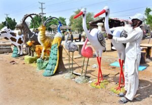 vendor displaying decorative statues different